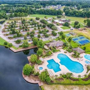 Aerial view of residential area with a pool and a