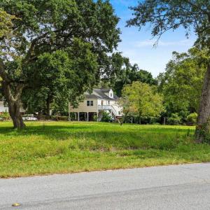 View of yard featuring view of wooded area