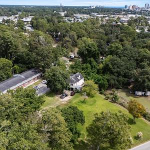 Aerial view of property and surrounding area featu