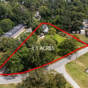 Aerial view of property and surrounding area featu