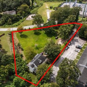 Aerial overview of property's location with proper