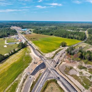 View of property location with a forest