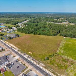 Aerial view of property and surrounding area featu