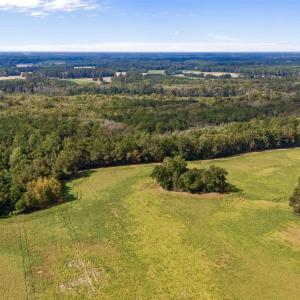 Aerial view of property and surrounding area featu