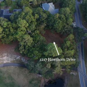 Aerial view of property and surrounding area with