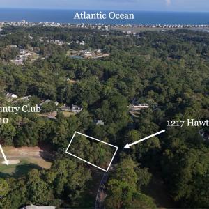 Aerial view of property and surrounding area featu