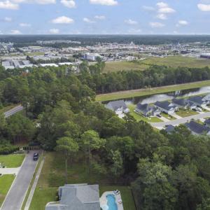 View of property location with a nearby body of wa