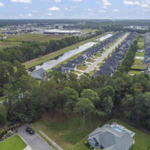 View of property location with a nearby body of wa
