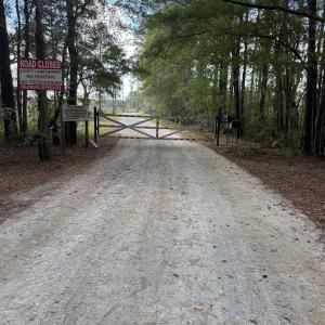 Entrance Gate to the Road to 405.58 Acres off of H