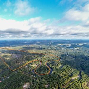 Aerial view of property and surrounding area featu