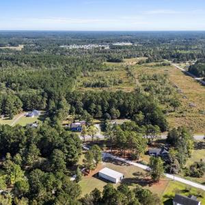 Aerial view of property and surrounding area featu