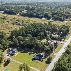 View of property location with a forest