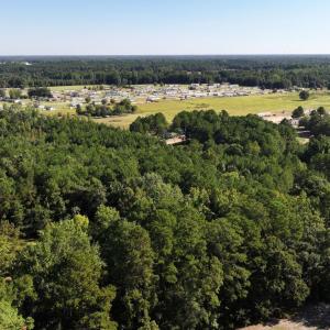Aerial view of property and surrounding area featu