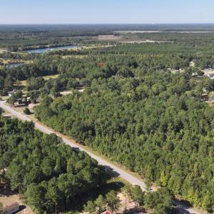 Aerial view of property's location featuring a for
