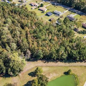 Aerial view of property and surrounding area featu