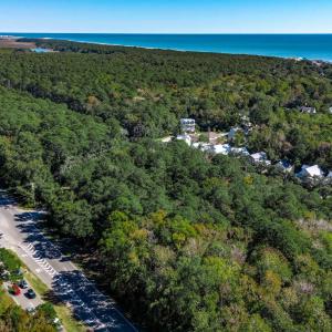 Aerial view of property and surrounding area with