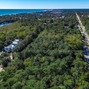 Aerial view of property's location with a large bo