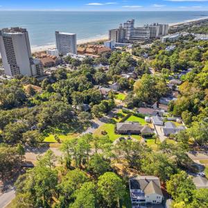 View of urban area featuring expansive beach