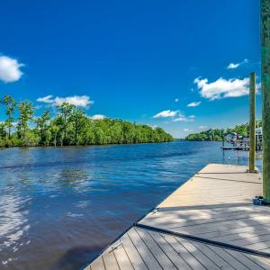 Dock area featuring a water view