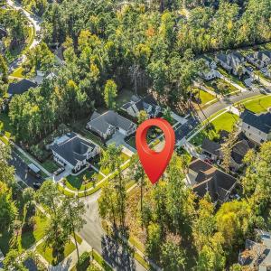 Aerial view of property and surrounding area with