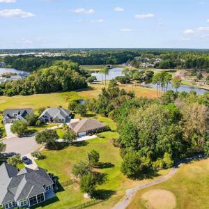 Aerial view of residential area with a local golf