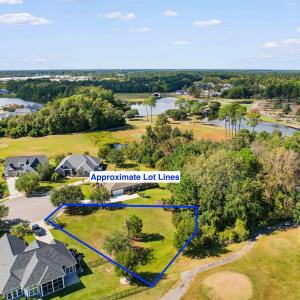 Aerial view of residential area with property boun