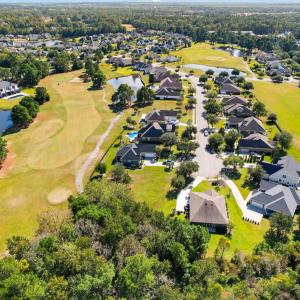 Aerial view of residential area with a golf course