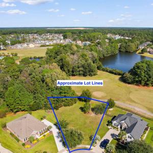 Aerial view of residential area featuring a nearby