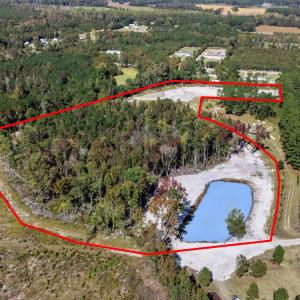 Aerial view of property's location with a nearby b