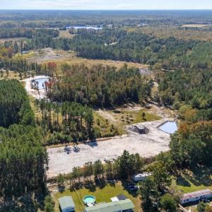 Aerial overview of property's location with a heav