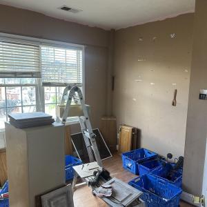 Misc room with a textured ceiling and wood finishe