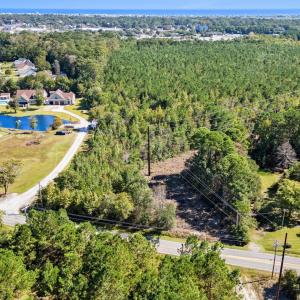 Drone / aerial view of a large body of water and a