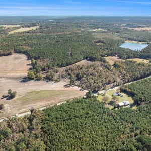 Aerial view of property and surrounding area with