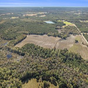 Aerial view of property and surrounding area featu