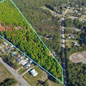 Aerial view of property and surrounding area featu