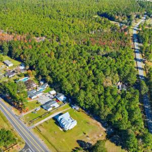 Aerial overview of property's location with a heav