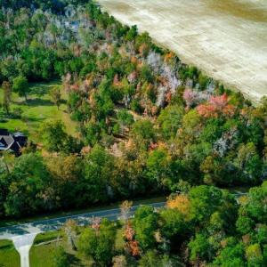 Aerial view of property and surrounding area with