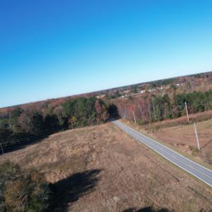 Aerial view of property's location with a heavily