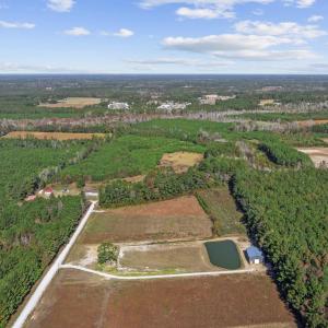 Aerial overview of property's location with a heav