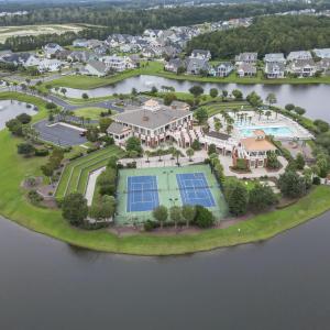 Aerial view of property and surrounding area featu