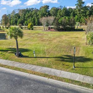 View of home's community featuring a lawn
