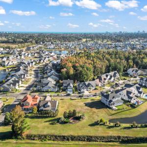 Aerial view of property's location with a nearby b