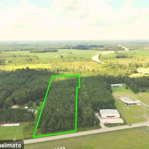 Aerial view of sparsely populated area with proper