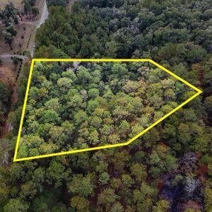 Aerial view of property and surrounding area with