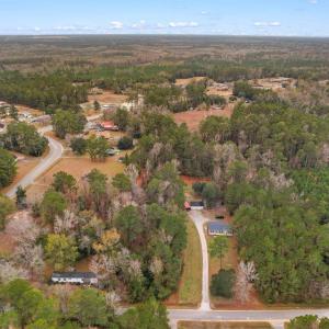 Aerial overview of property's location with a fore