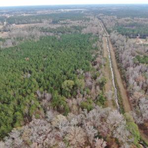 Aerial view of property and surrounding area with
