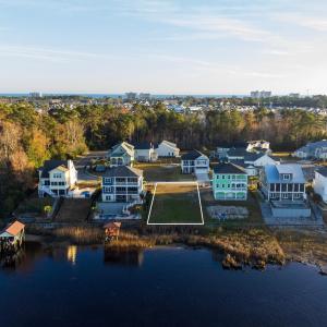 Aerial view of residential area featuring a nearby