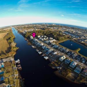 Aerial view of property and surrounding area featu
