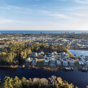 Aerial view of residential area with a nearby body