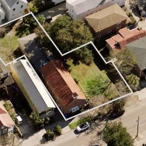 Aerial view of residential area featuring property